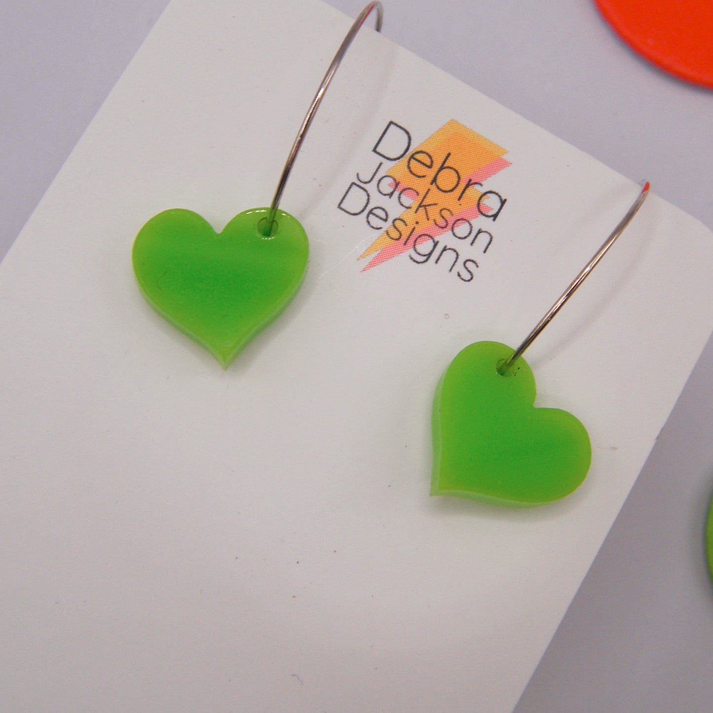 Lime green heart hoop earring
