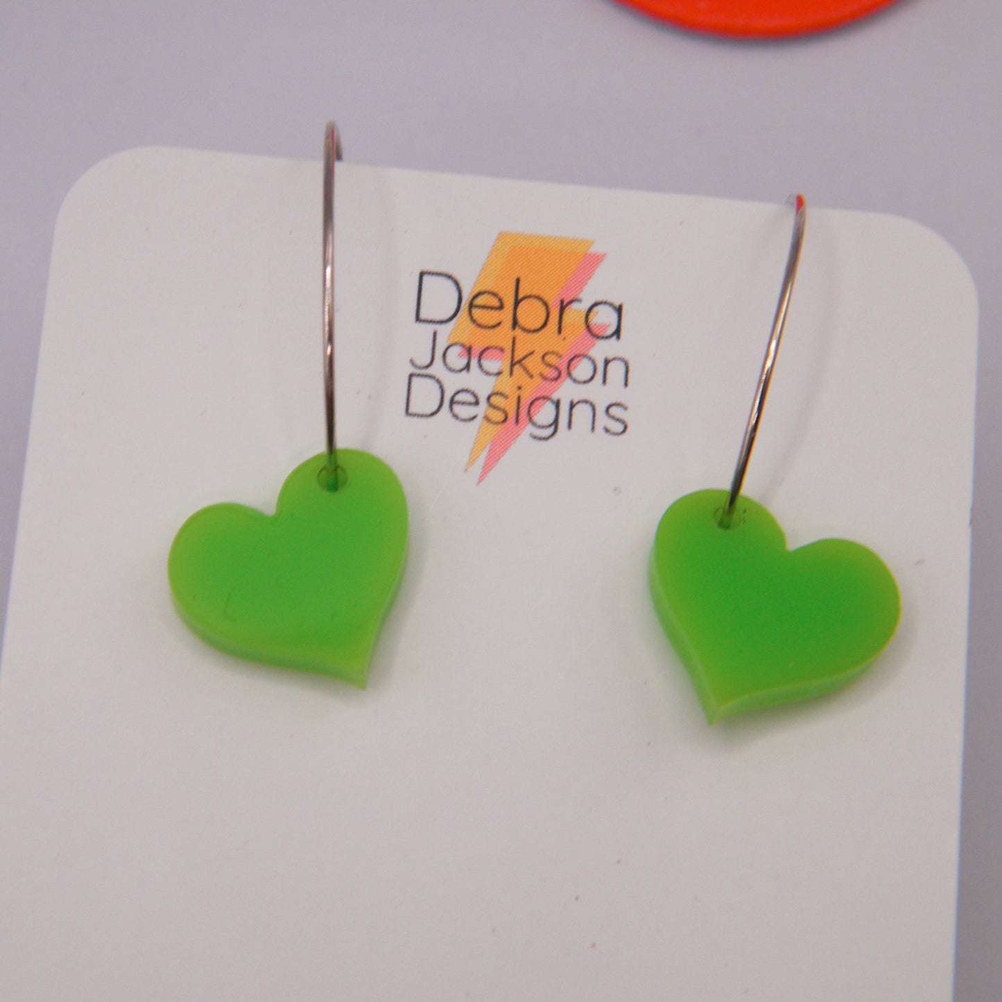 Lime green heart hoop earring