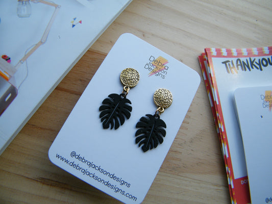 Black and gold monstera earrings