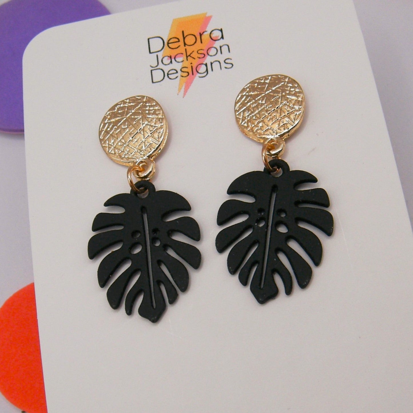 Black and gold monstera earrings