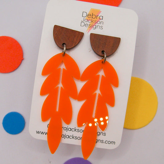 Orange and wood feather earrings