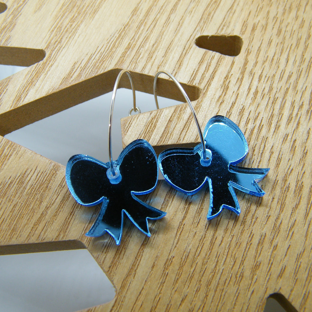 Blue mirrored bow hoops