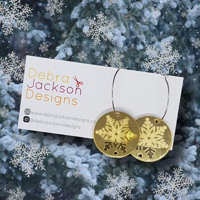 Gold snowflake hoop earrings