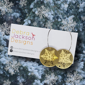 Gold snowflake hoop earrings