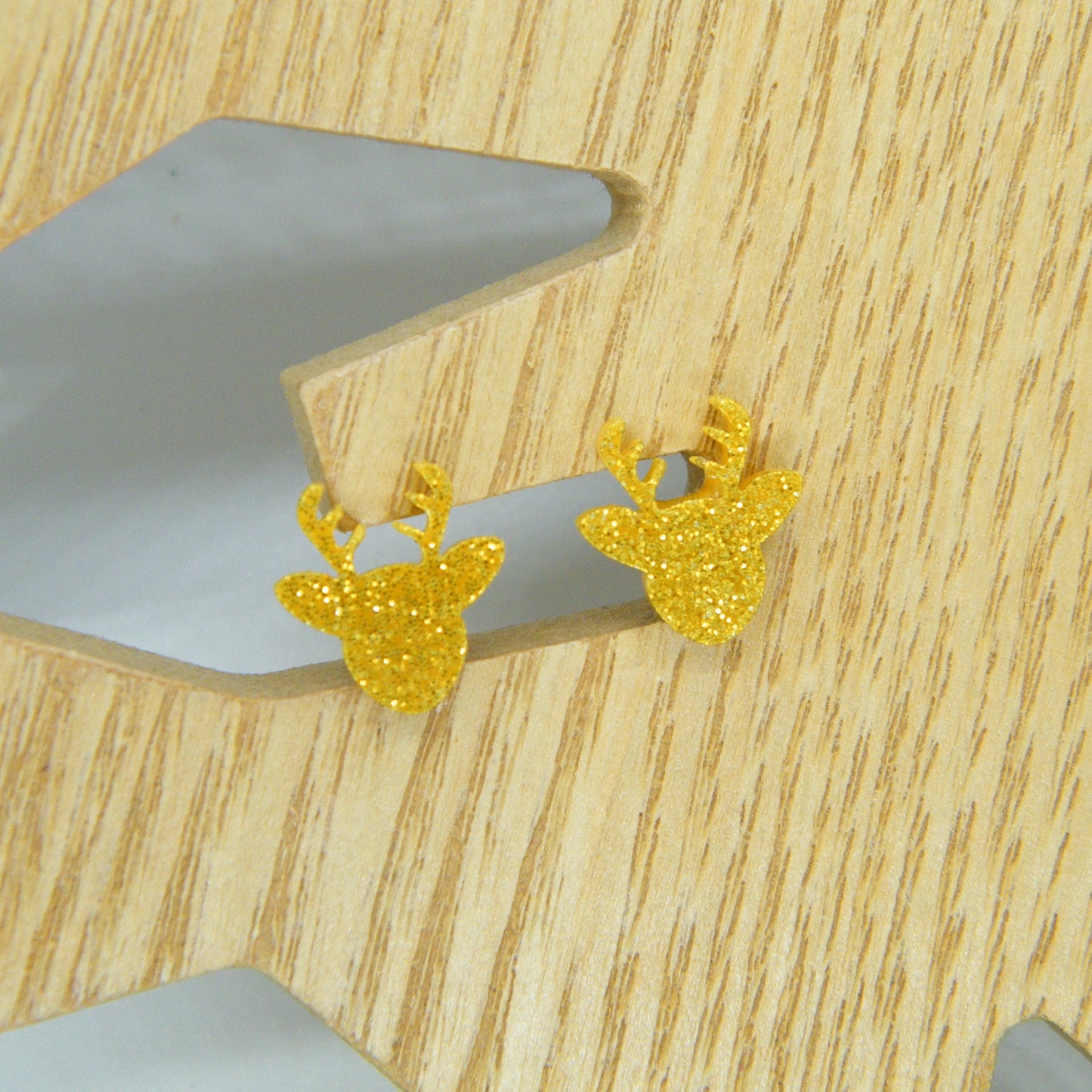 Gold deer stud earrings