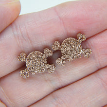 Load image into Gallery viewer, Skull and crossbone stud earrings