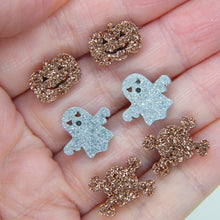 Load image into Gallery viewer, Skull and crossbone stud earrings