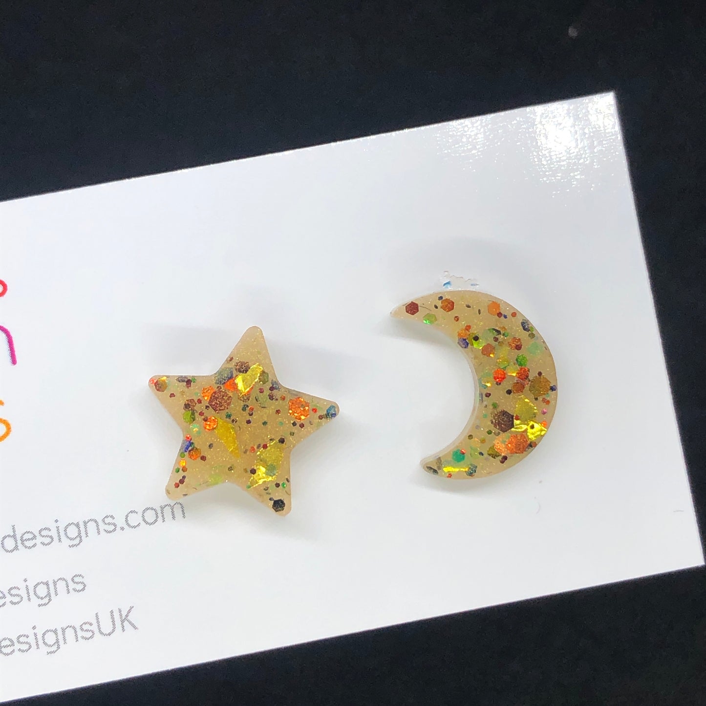 Gold star and moon stud earrings