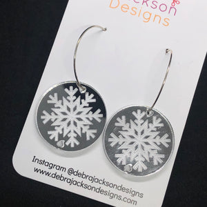 Silver snowflake hoop earrings