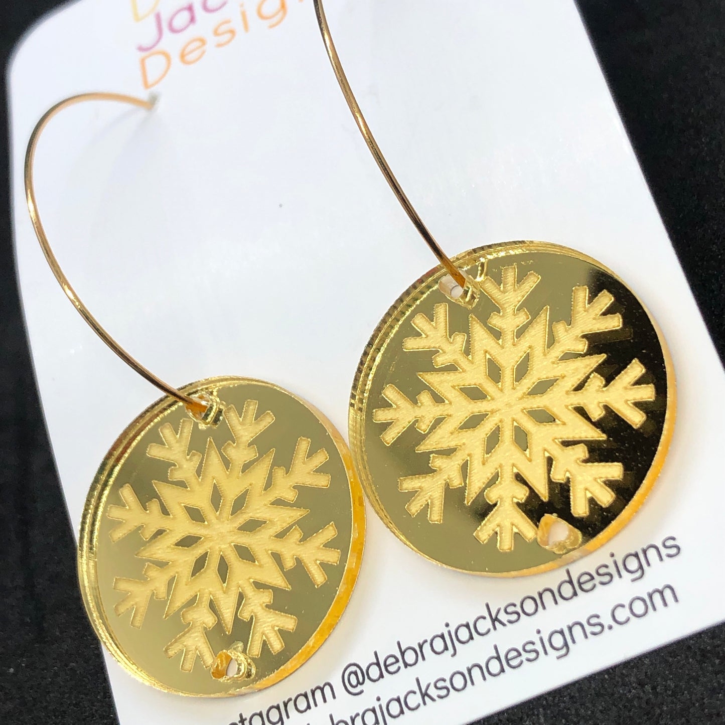 Gold snowflake hoop earrings