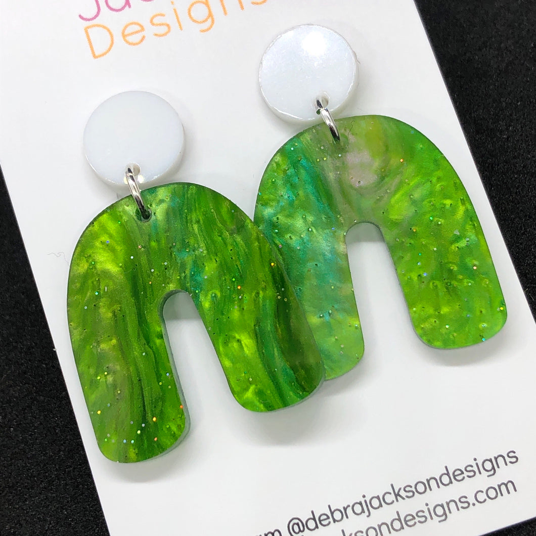 Green galaxy arch earrings
