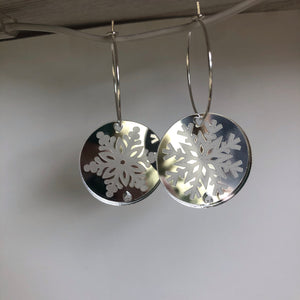 Silver snowflake hoop earrings