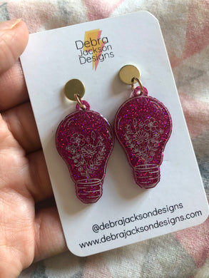 Pink glitter lightbulb earrings